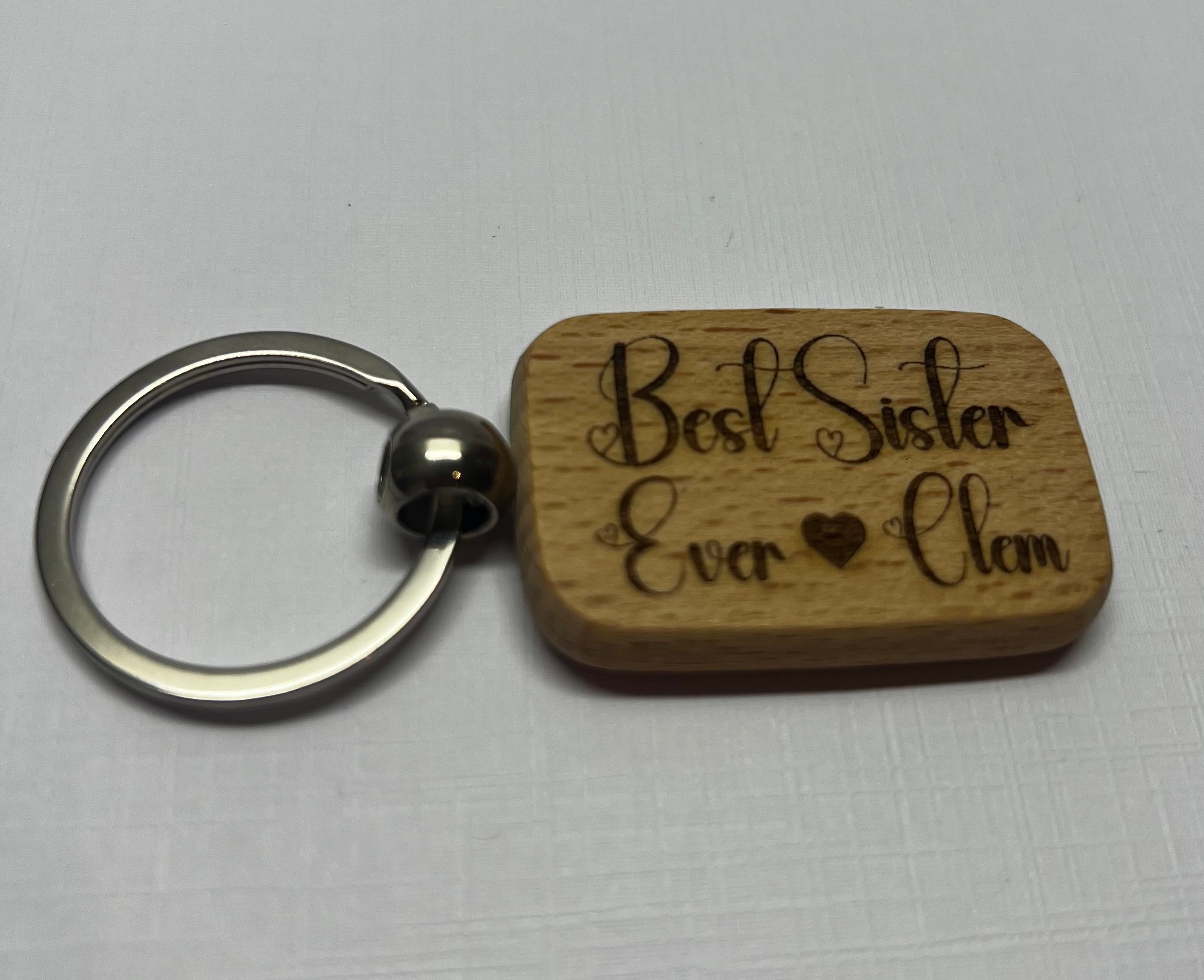 ✨ Porte-clés en bois gravé – Texte personnalisé